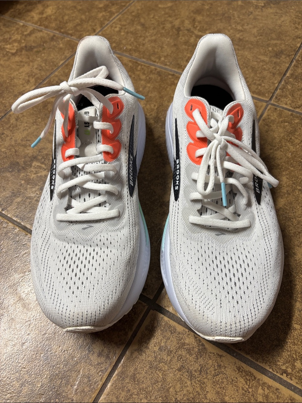 Brooks Women's White Running Shoes with Coral Eyelet Accents size 8